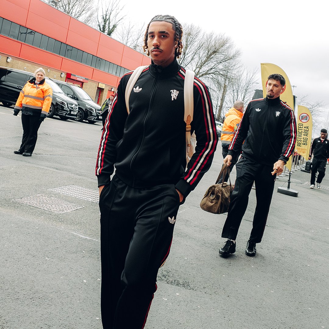ManUtd's tweet photo. The adidas Originals track top and pants are 🔥🖤