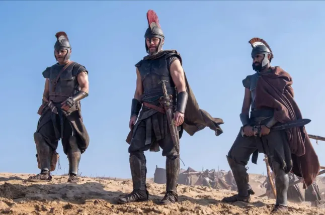 Knightly_Hist's tweet photo. I would be fine with this approach if they actually comitted to a classical greek aesthetic, instead of whatever random biker leather nonsense we're getting from Nolan. https://t.co/h23gcxaBGE