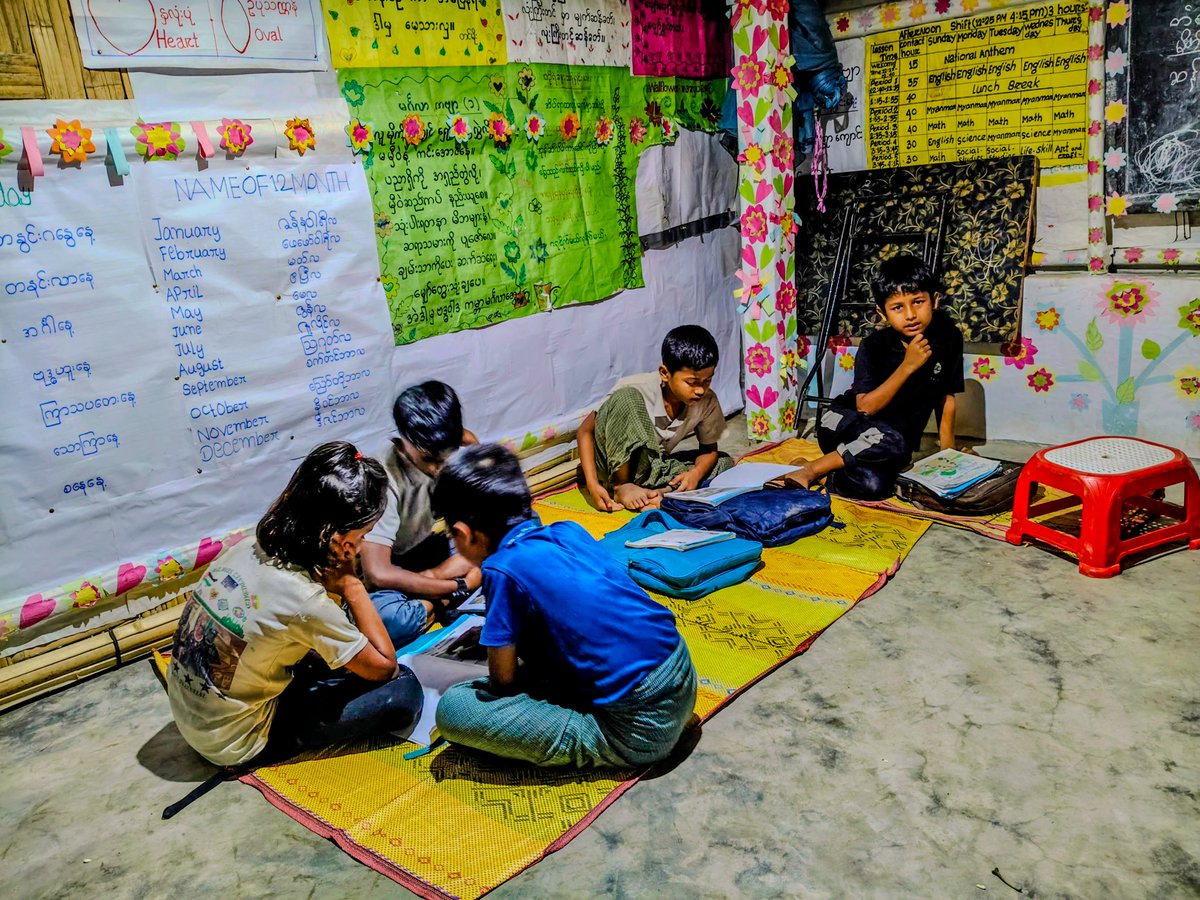 RoAnisHlaMyint's tweet photo. Some Rohingya children are studying their Grade 2 English books at home during the night.
#RohingyaRefugeeCamps #EducationForAll #InspiringYouth #NighttimeStudy #HopeThroughLearning
@RoAnisHlaMyint https://t.co/DU17K979YE