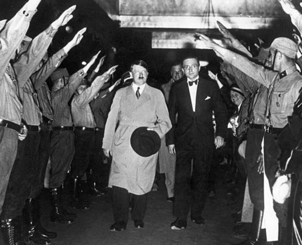 AEichorst47312's tweet photo. Photograph of Adolf Hitler as he attends the premiere of "Storm Detachment Men Brand", given to the UFA Palace Theatre in Berlin. He is seen passing through a double row of Storm Detachment Men standing at attention. - 14 June 1933
#history #photography #politics #knowledgeispower