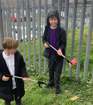 PrimaryElaine's tweet photo. Our Year 1 and 2 eco-warriors have been busy protecting our planet! 🌍 The children took to the school field for a very successful litter pick, they  absolutely loved making a difference! 🚮✨ https://t.co/V3RXwGbcS9