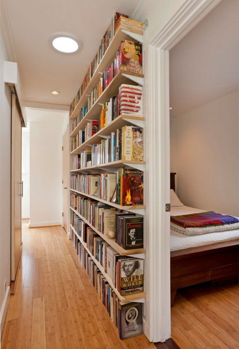 Watchman_motto's tweet photo. Never organize book shelves in some trendy visual way. (Spines facing in, grouped by color).

Always organize alphabetically, into sections that make sense. Fiction by author, non-fiction by subject. Poetry, biography, reference. https://t.co/wK8Up5sZZq