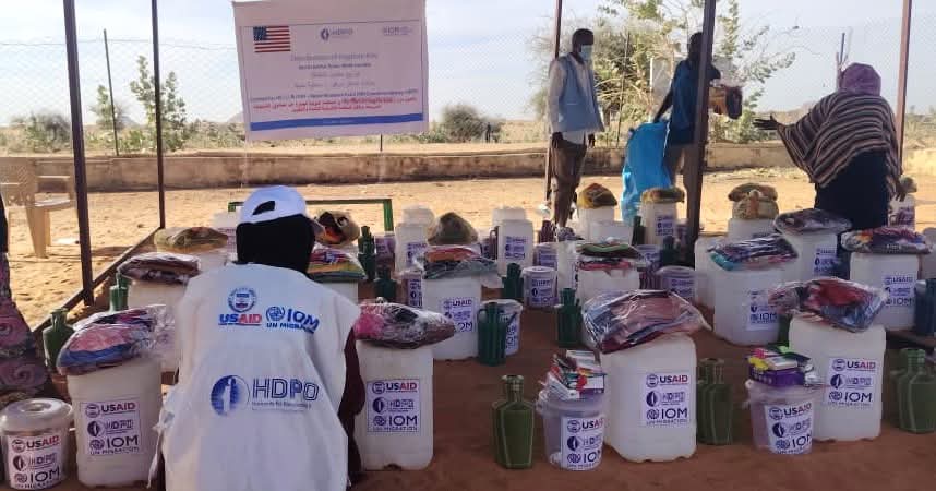 HDPO12's tweet photo. HDPO launched the distribution of 350 dignity kits for vulnerable women and girls across IDP camps and vulnerable host communities in Mellit, North Darfur.

📦 On 11 Mar 2026, 83 kits were distributed at Al-Abbasi (B) IDP Camp (50 to IDPs, 33 to vulnerable host community families). Distribution will also reach Al-Wahda, Al-Thanawiya, and Al-Guba.

Implemented with @IOMSudan and funded by the @StateDept

#HDPO
 #Protection
 #GBV 
#Sudan