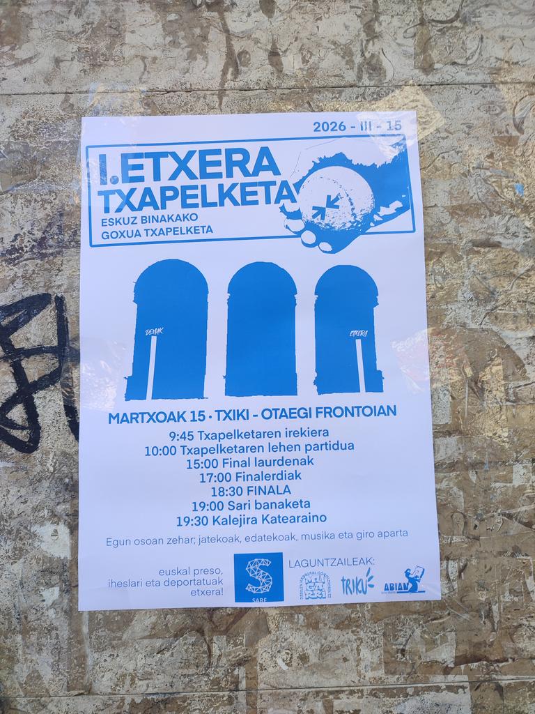 En este cartel de un campeonato de pelota en favor de los derechos de los presos de ETA se ha escapado algo de lo inconsciente: en vez de un frontón parecen tres lápidas. Que esté colocado en el lugar exacto donde ETA asesinó a Lidón pone los pelos de punta.