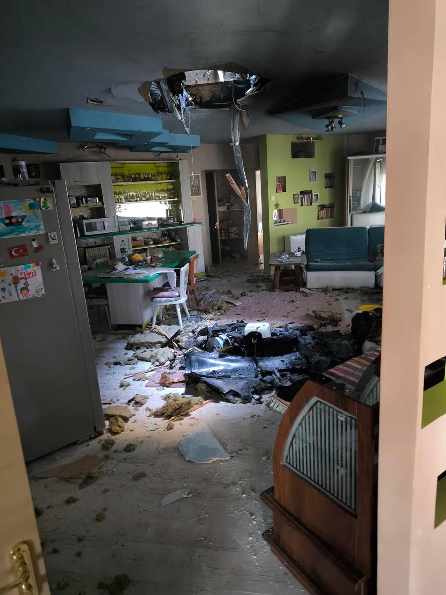 BohuslavskaKate's tweet photo. In Mykolaiv, a Shahed drone with a warhead of about 100 kilograms pierced the roof and floors of a residential building but, by sheer miracle, did not detonate.

This our daily life in Ukraine because our neighbors are genocidal war criminals. https://t.co/0VBIGWXxwg