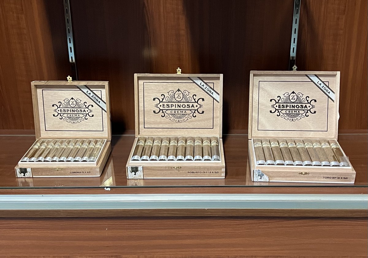 CigarCove's tweet photo. Espinosa Crema on the shelf looking smoother than my golf swing on a good day (rare). 

Nicaraguan core + Ecuadorian Connecticut = creamy perfection that says 'relax'... while I pretend I'm going to savor it slowly.

#EspinosaCrema #CigarCove https://t.co/uLUqZZsTl7