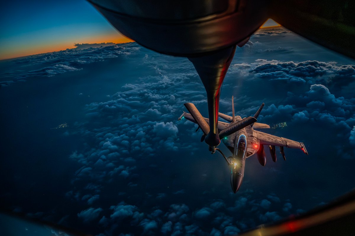 CENTCOM's tweet image. A U.S. Air Force KC-135 Stratotanker refuels a U.S. Navy F/A-18F Super Hornet over the middle east during Operation Epic Fury.