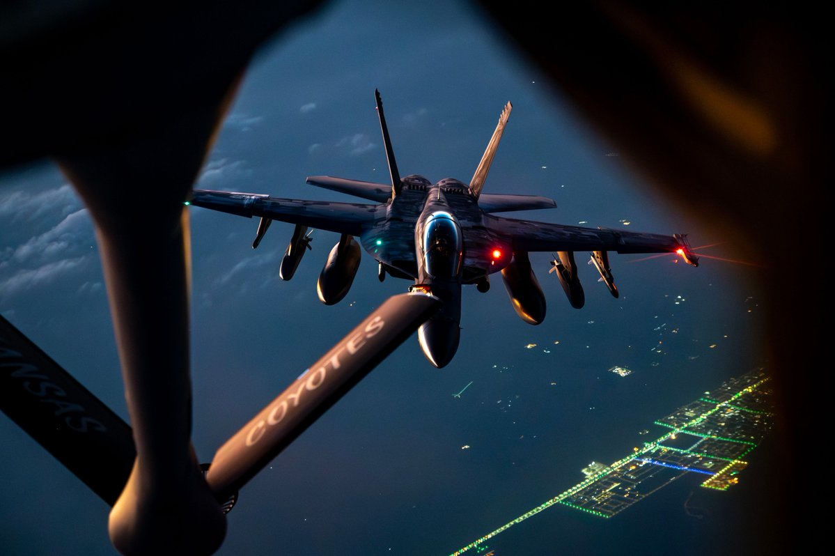 CENTCOM's tweet image. A U.S. Air Force KC-135 Stratotanker refuels a U.S. Navy F/A-18F Super Hornet over the middle east during Operation Epic Fury.