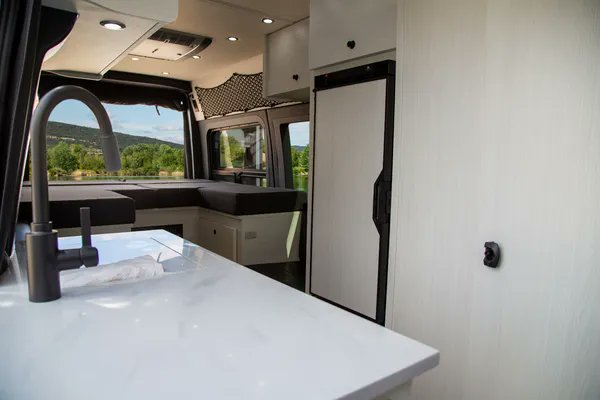 pleasurewayrv's tweet image. The Plateau RB boasts a raised bed with large rear cargo area underneath for chairs and outdoor gear. And when you need to load something larger, the bed can fold up to open the full rear cargo space, making it easy to bring along bikes or bulkier equipment.

#ClassBRV #VanLife