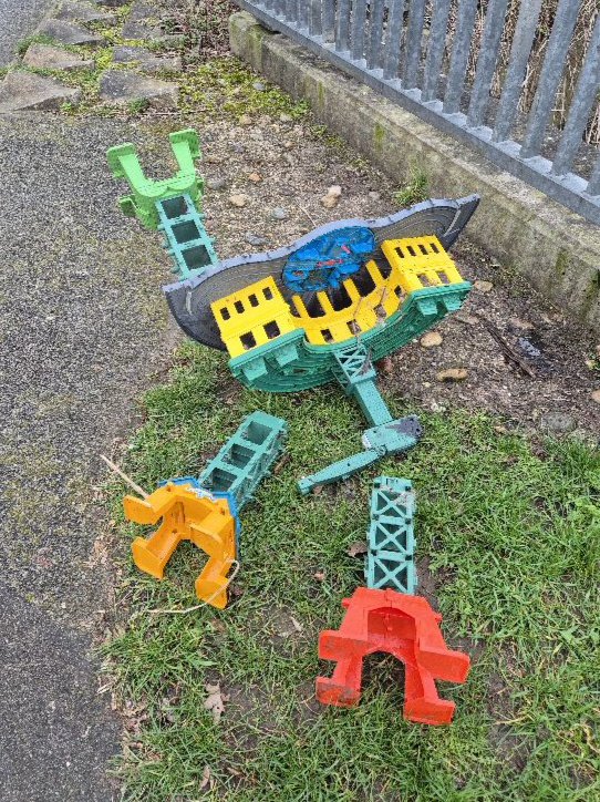BBullrushes's tweet photo. A very windy afternoon walk &amp; we spotted #flytipping in our local #Thulston brook.  Back with our long pole &amp; hook to remove it. Somehow we don't think the wind was strong enough to dump this toy crane deck here. 🤔 #LoveWhereYouLive @LitterReporting #Derby #NotABin https://t.co/1MAFynPJp7