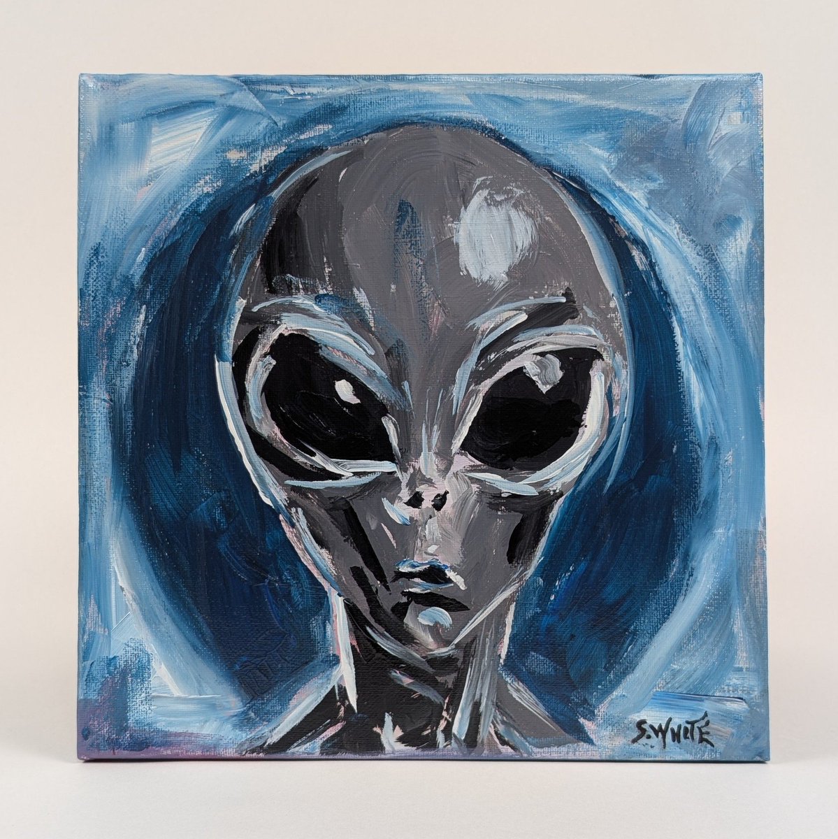 seekrbots's tweet photo. “Gray Area”
She hovers in the void—massive black eyes swallowing light, smooth gray skin catching faint blue swirls, lips a thin line of silent knowing. Eerie calm meets cosmic mystery in one unflinching, otherworldly stare.
Acrylic on canvas – still watching, still waiting.
10"x10"