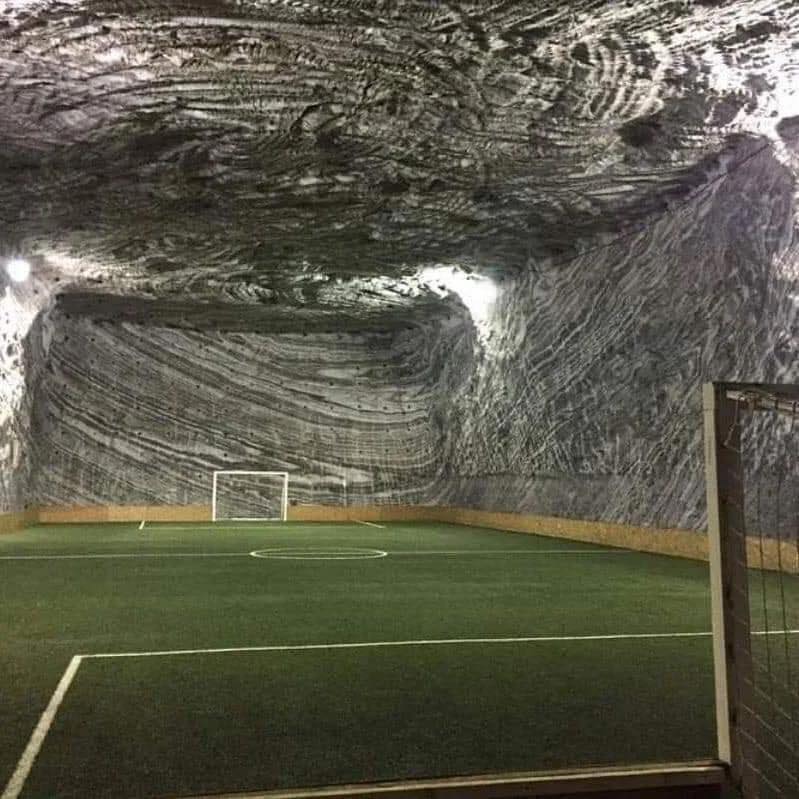 A football pitch 30 metres below the ground in a Salt Mine in Romania.