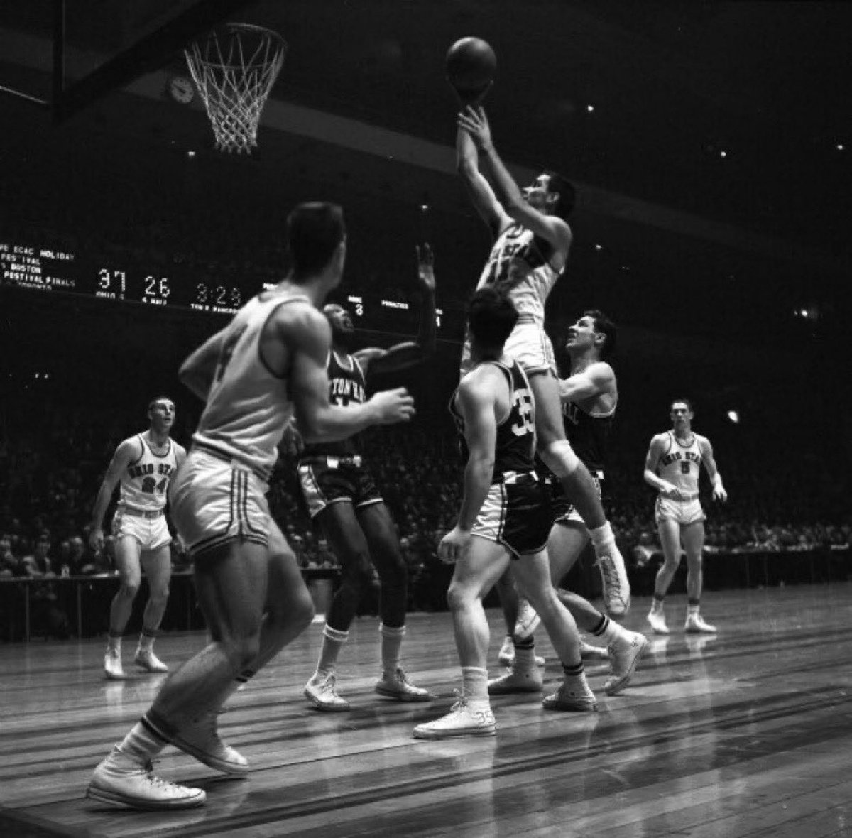 sigg20's tweet image. “Old Days”Ohio States Jerry Lucas puts up shot as 
#24 Bob Knight and #5 John Havlicek watch during a game vs Seton Hall in the 1960 Holiday Festival at the
 “Old” Madison Square Garden.#OhioState #Buckeyes #NCAA #NYC #1960s