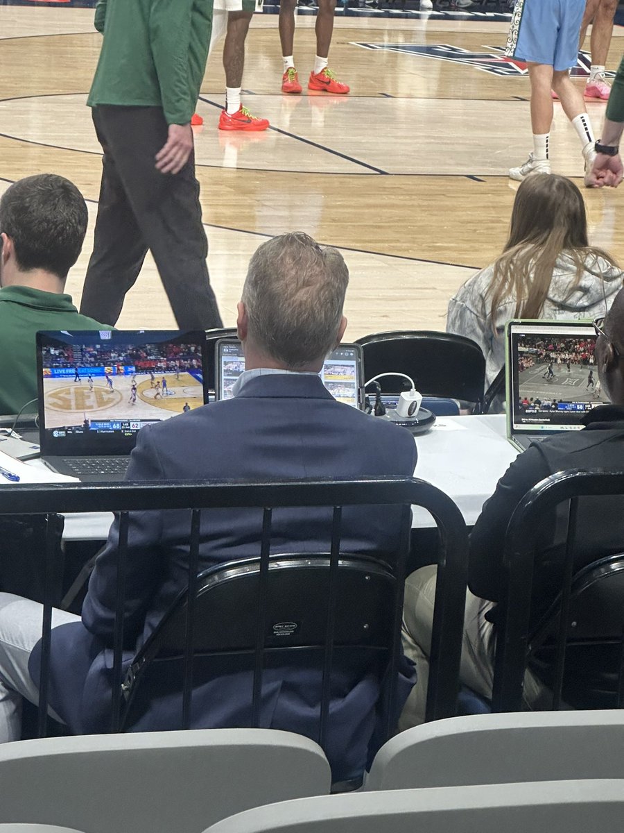 mdv483's tweet photo. Charlotte coach complained to these guys about not getting a call.  However, they were busy watching the SEC game. https://t.co/vLfdlxAc0Q