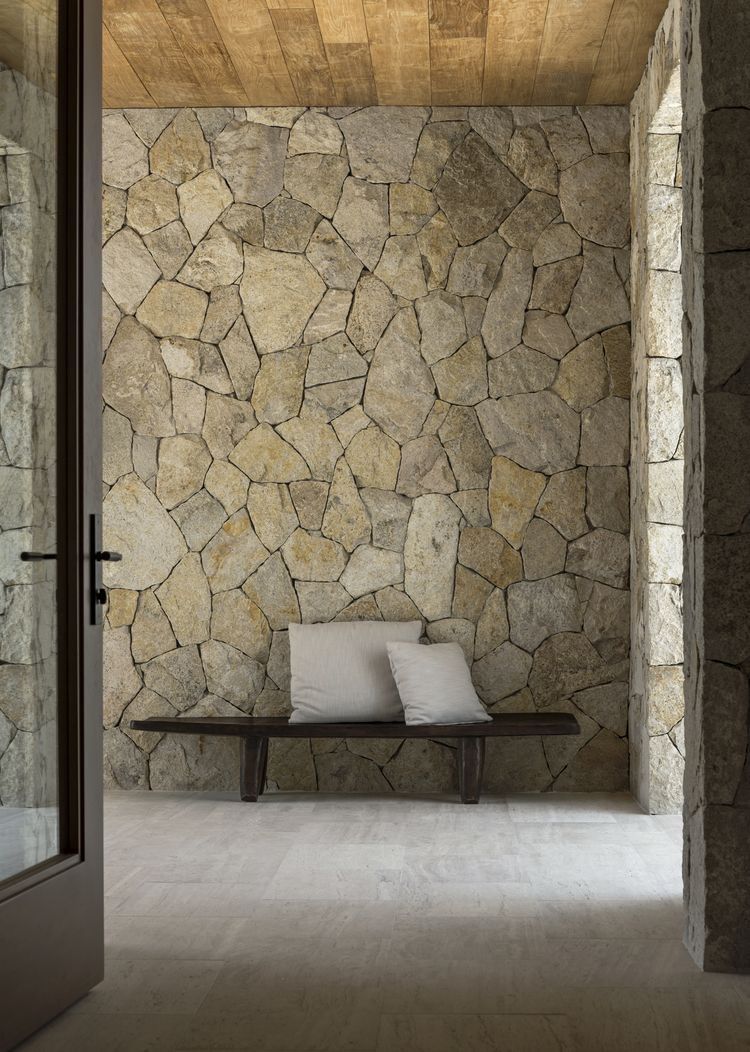 Natural stone feature walls create timeless elegance and texture in any space. This design blends rustic stone with warm wood for a luxury modern look.

Find more masonry inspiration:
 arnoldmasonryandlandscape.com

#StoneMasonry #NaturalStone #HomeDesign #LuxuryHomes #GeorgiaHomes