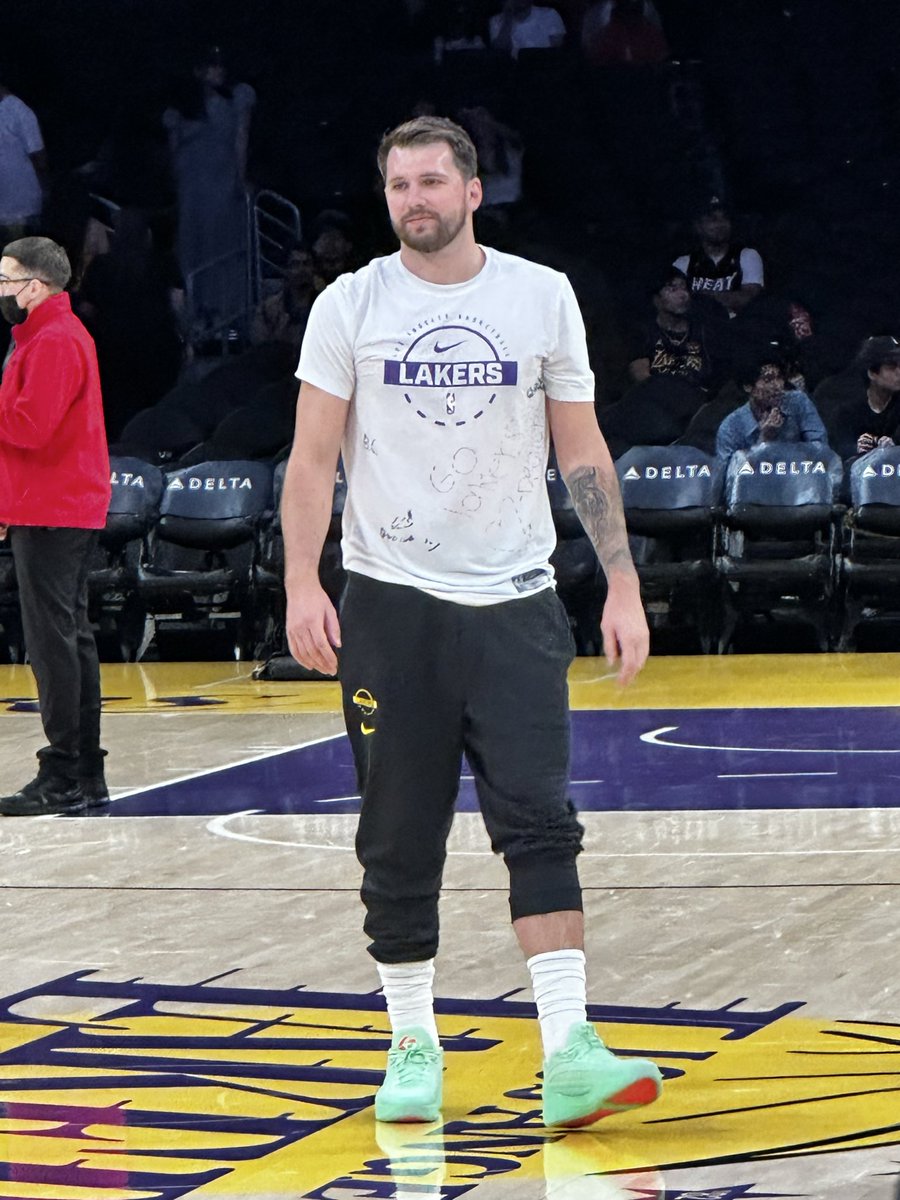 mcten's tweet photo. As @DanWoikeSports pointed out, Luka Doncic’s warmup shirt was signed by patients during the team’s visit to a UCLA Health hospital this week https://t.co/H6eBnR89Kk