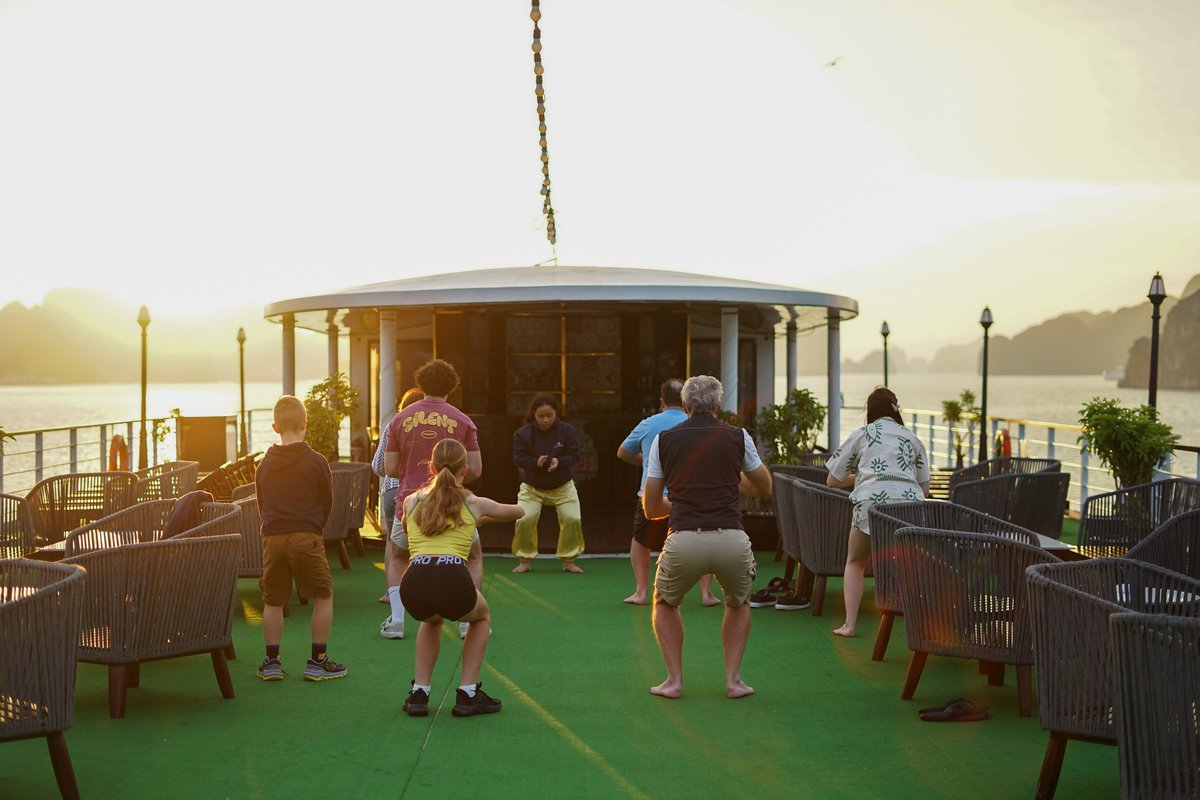 CruisesMon's tweet photo. Welcome the new day in perfect harmony 🌅
As the first light rises over the limestone karsts of Lan Ha Bay, guests aboard Mon Cheri Cruises are invited to begin the morning with a peaceful Tai Chi session on the sundeck.
🌐 Website: https://t.co/vEf6VNYyLg
#MonCheriCruises https://t.co/RR2ZCMZFSh