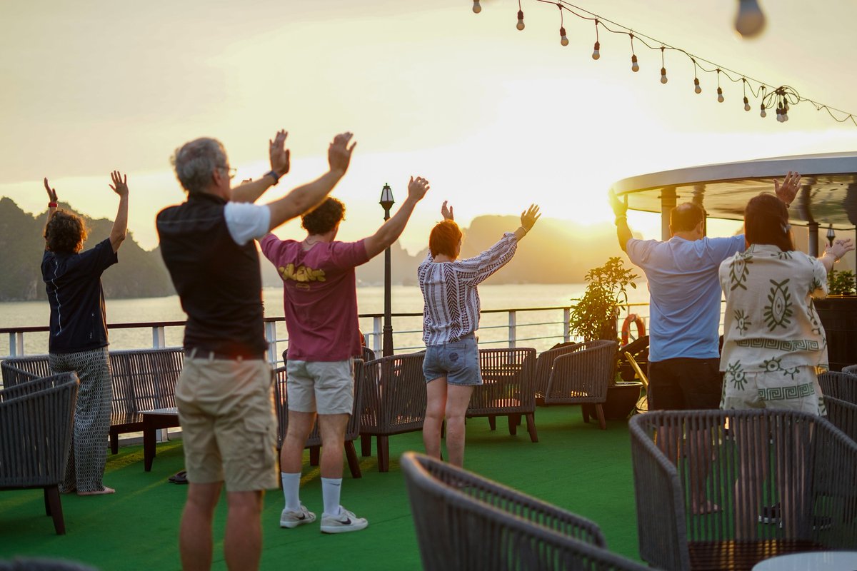 CruisesMon's tweet photo. Welcome the new day in perfect harmony 🌅
As the first light rises over the limestone karsts of Lan Ha Bay, guests aboard Mon Cheri Cruises are invited to begin the morning with a peaceful Tai Chi session on the sundeck.
🌐 Website: https://t.co/vEf6VNYyLg
#MonCheriCruises https://t.co/RR2ZCMZFSh