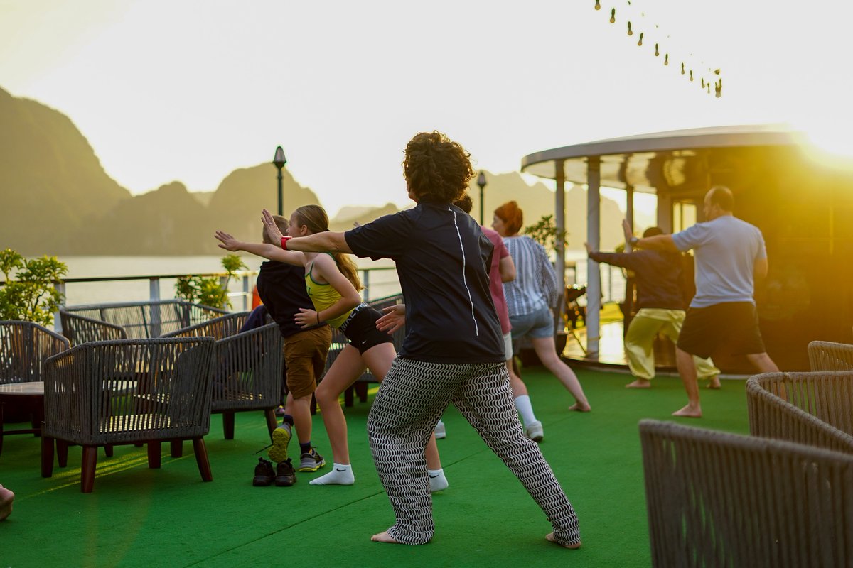 CruisesMon's tweet photo. Welcome the new day in perfect harmony 🌅
As the first light rises over the limestone karsts of Lan Ha Bay, guests aboard Mon Cheri Cruises are invited to begin the morning with a peaceful Tai Chi session on the sundeck.
🌐 Website: https://t.co/vEf6VNYyLg
#MonCheriCruises https://t.co/RR2ZCMZFSh