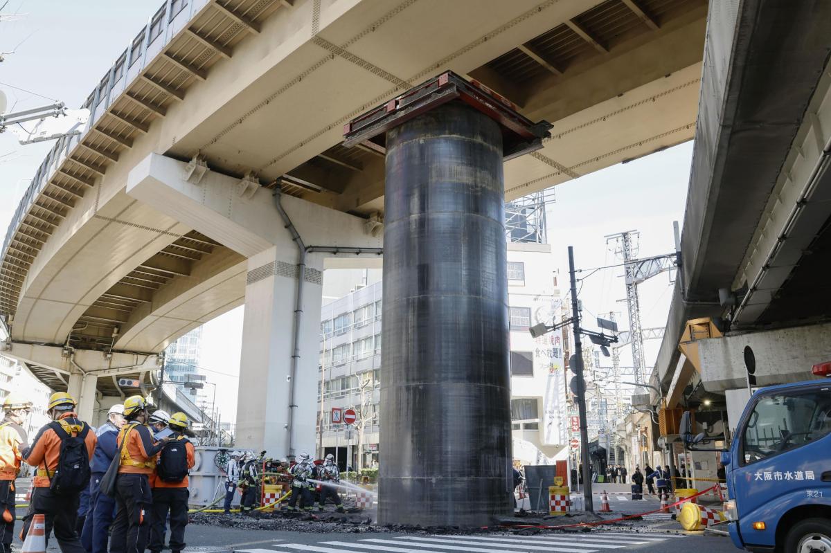 nypost's tweet photo. Giant pipe mysteriously bursts through ground, rises 30 feet above road in Japan https://t.co/Q5Ubh6DJxO https://t.co/tf70GFfp8f