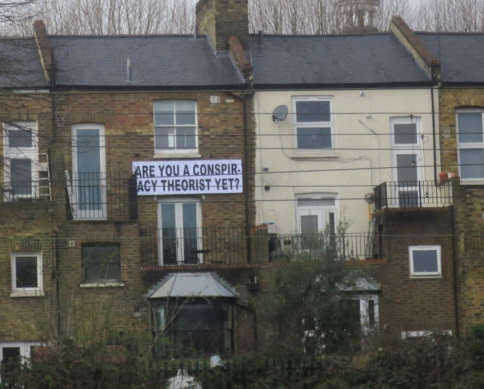 BGatesIsaPyscho's tweet photo. Spotted from a Train hanging from a House in London. https://t.co/O5fE3DD1L8