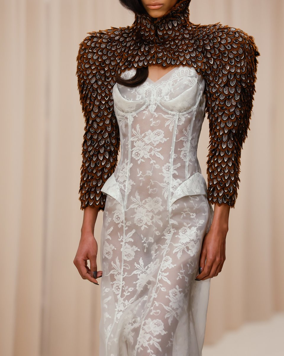 McQueen's tweet photo. McQueen Autumn Winter 2026 

Tactile artistry. Intricate layered feather embroideries in frayed organza, satin stitch and bullion. https://t.co/TJI8NRnv41