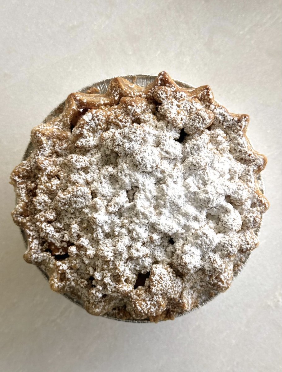 BayouBakery's tweet photo. We're doing the math for Pi Day: spiced apples + buttery crust + crunchy topping = our Cinnamon-Apple Crunch Mini Pie. Celebrations start TODAY at Bayou Bakery!
.
.
.
.
.
#eatlocal #piday #minipie #applecinnamon #arlingtoneats #dmvfoodie https://t.co/V04L5tZGps