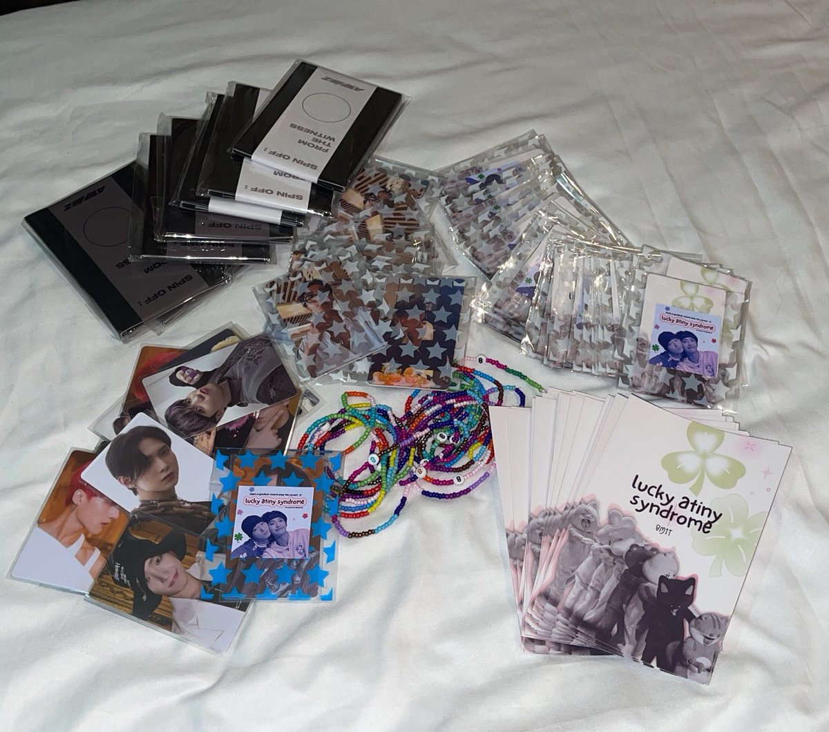 freebies all prepped! added spin off unsealed albums din. will randomly give these kahit shy ako <33 see u poo