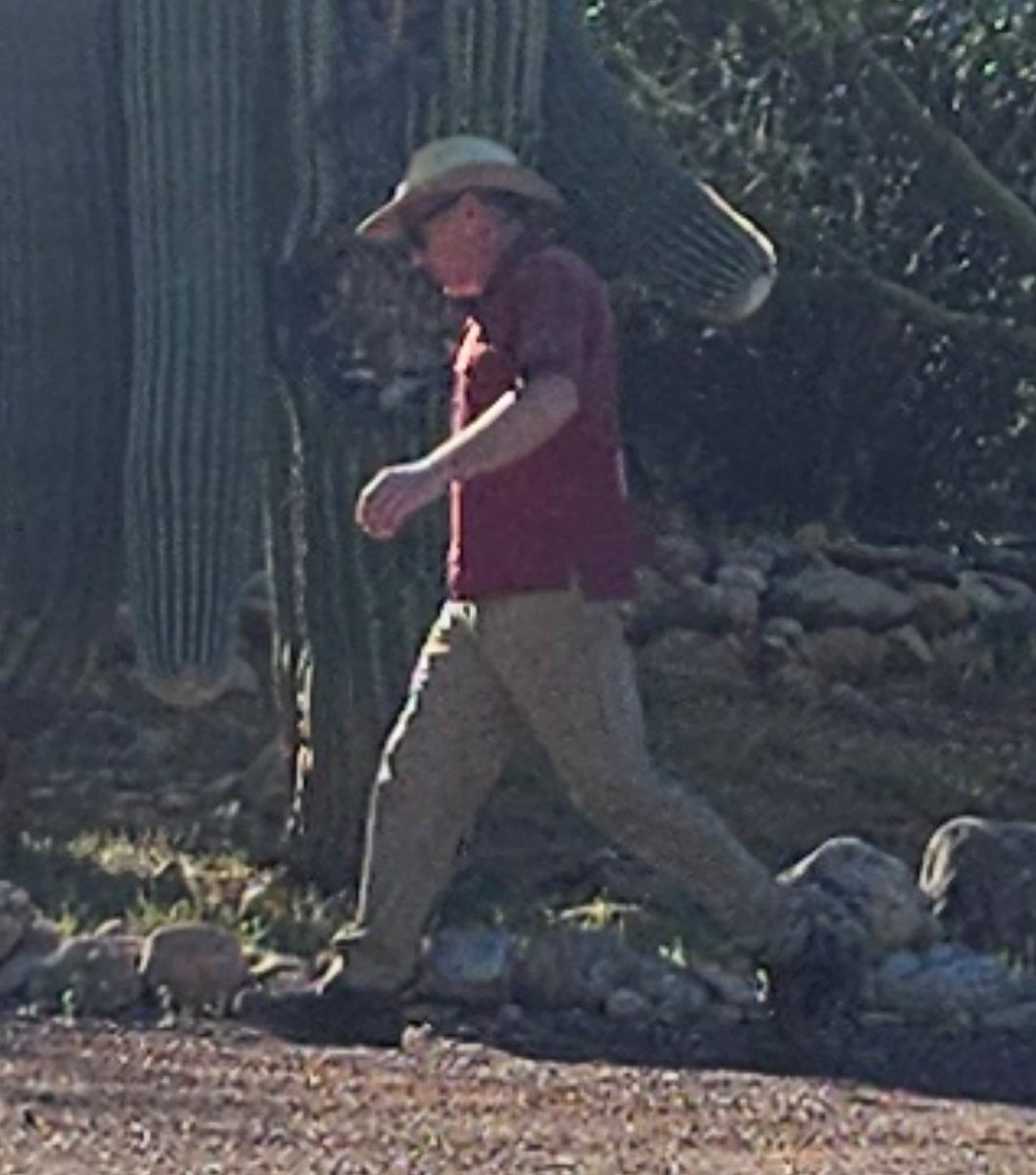 Man walking around Nancy Guthrie's property. Arrived in a red truck alone.