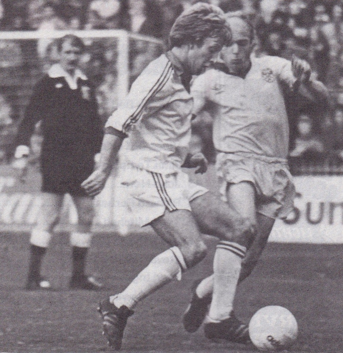 Referee Ray Lewis (Great Bookham) observes a challenge for the ball in the Exeter (then playing in all-white)-Chester game in November 1978. This was early in his 18 seasons a Football League ref (1975-1993) in which he also reached the FIFA list &amp; was one of the first PL refs.