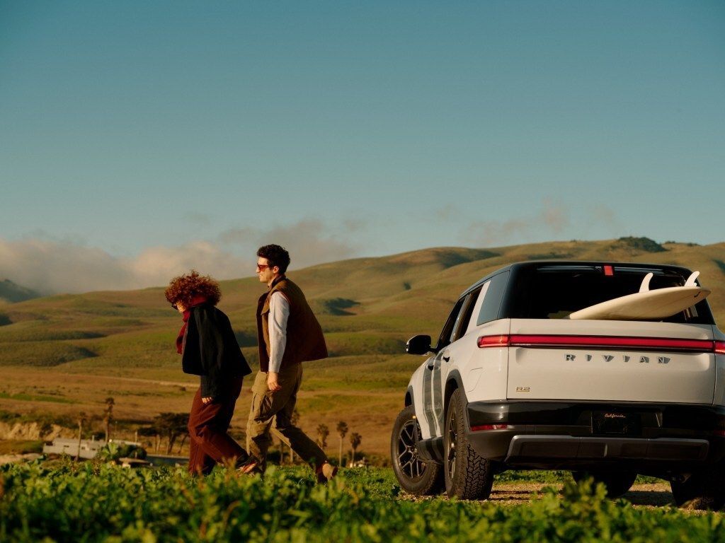 dailytechonx's tweet photo. Rivian delays $45K R2 base model to late 2027, citing strategic rollout plans amid evolving market conditions. Link: https://t.co/u7coQB92Uq #Rivian #R2 #BaseModel #Launch #Delay #2027 #Strategic #Plans #Market #Conditions #Finance #Automotive #Technology #Innovation #Vehicles #Electric #Future #Mobility #Sustainability #Transport