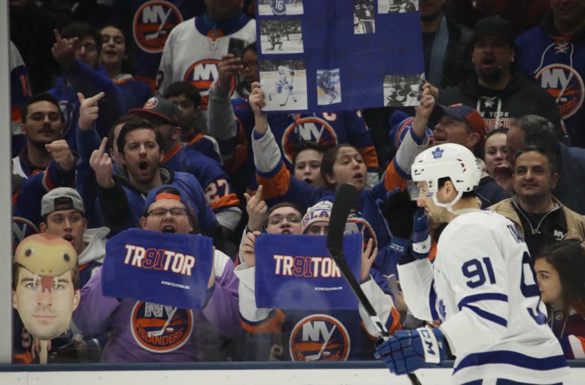 puckempire's tweet image. Don't know if we'll ever see a player reception as negative as John Tavares' return to NY again.

Tavares left as captain in free agency. In his first game back in NY, the Isles clobbered him and the Maple Leafs, 6-1.