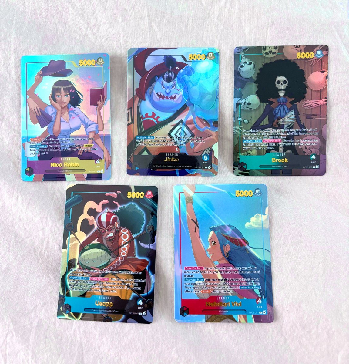 My new custom leader cards for the One Piece Card Game came in! I think  they came out pretty awesome! I ended up selling out of Robin at ALA so I  took