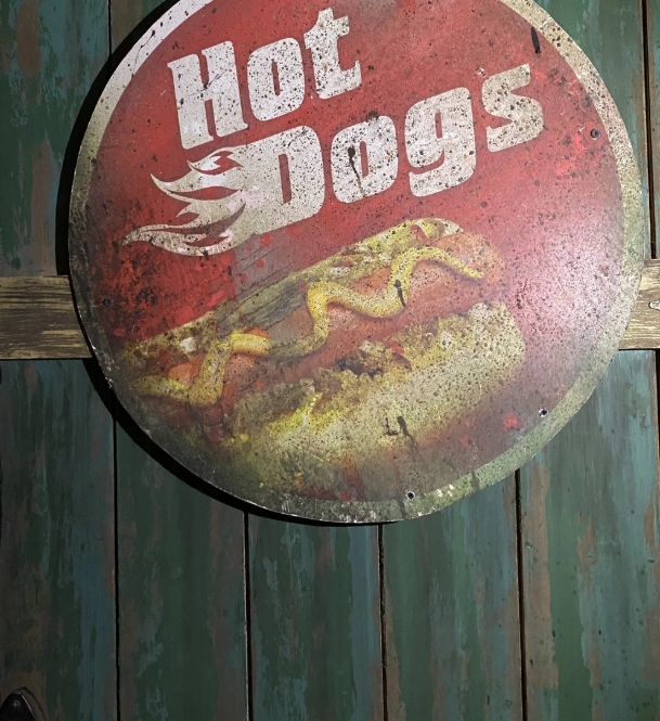 HhnWiki's tweet image. Something of note, when brightening up the HHN 35 logo:

The color scheme of the fences matches the opening scene of the Dr. Oddfellow's Twisted Origins haunted house during Halloween Horror Nights 32!

Second image from Horror Unearthed!