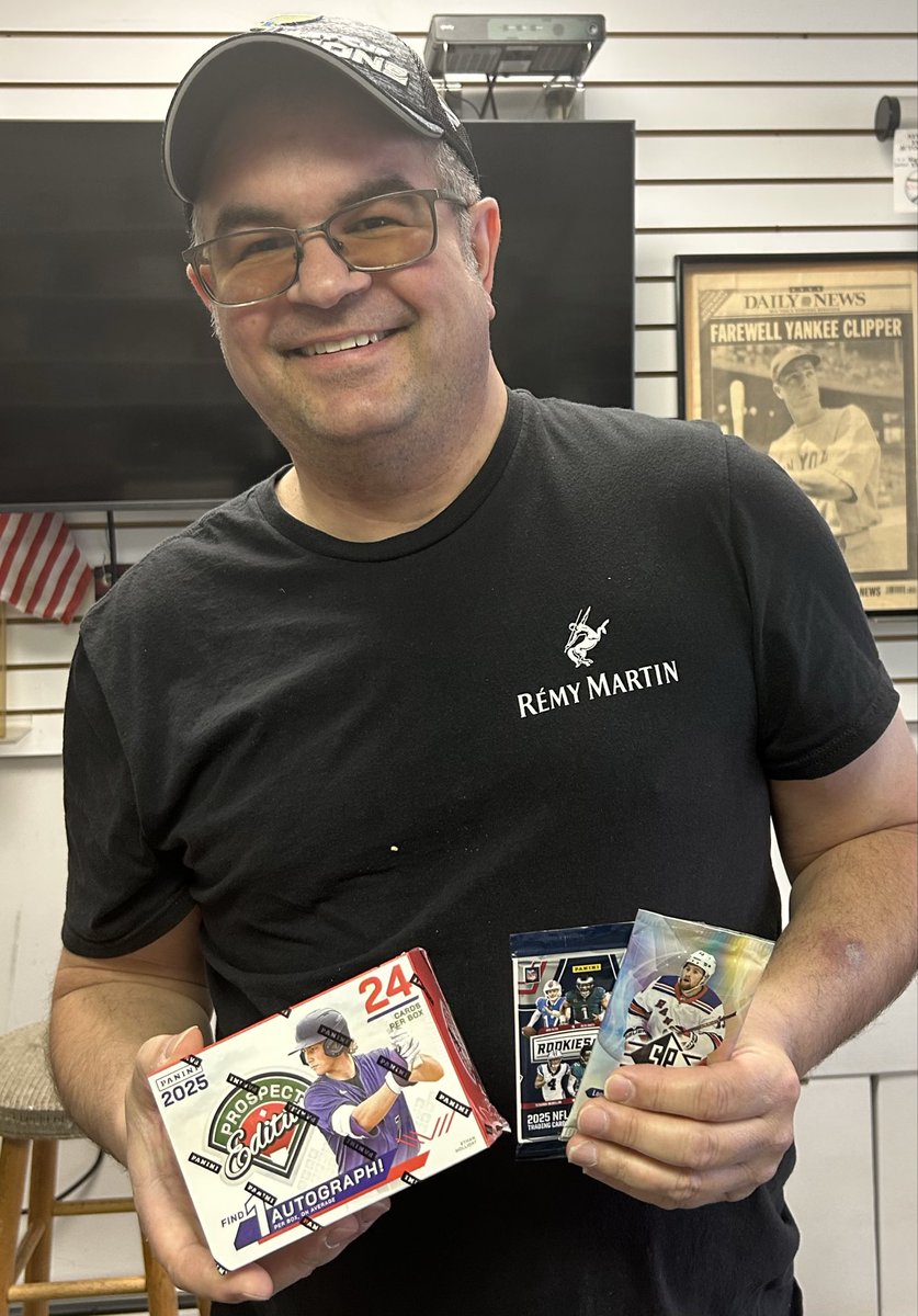 A customer from Elizabeth is happy that he visited ATTACK OF THE BASEBALL CARDS on their 44th Anniversary!!!