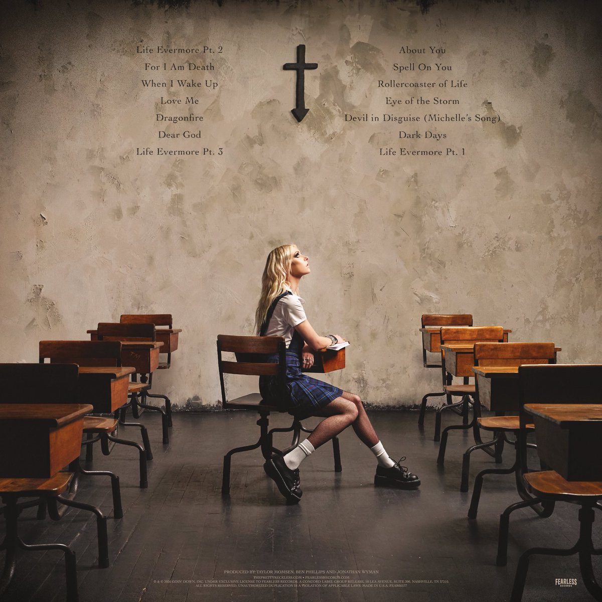 tprxzombiee's tweet photo. Did anyone else notice this on the backside of the ‘Dear God’ album cover? TM for Taylor Momsen ♥️ https://t.co/tcnSYJGYqz