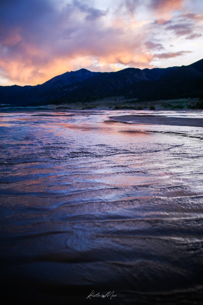 Ripples gently expanding, as light dances on the stream. The shadows hold their breath, as they slip into a dream. The sound of water carving sand, and the gentle whisper of the wind, was a song from nature to my heart, as sunlight graced the land.