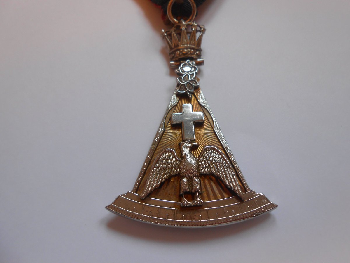 charingmarket's tweet photo. Freemasonry has always thrived on symbolism and ceremony. This Scottish 18th Degree jewel, worn on an embroidered sash, brings together crown, cross, swan and pelican in a remarkable piece of regalia craftsmanship. From our blog. https://t.co/oE9kktycLc https://t.co/aMKFxODvvC