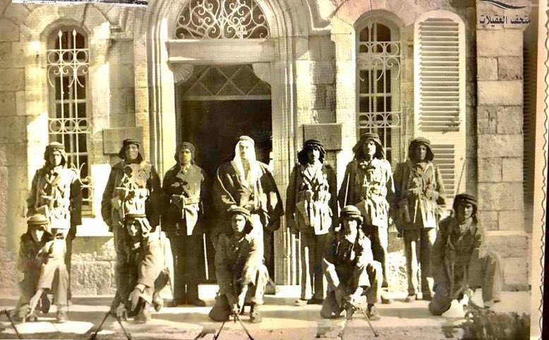 Archives_Athar's tweet photo. القدس قبل 1948 مقر القنصلية السعودية في حي الشيخ جراح. يظهر في الصورة الوزير المفوض عبد العزيز الكحيمي محاطاً بجنود الحراسة السعوديين بزيّهم العسكري المهيب. وثيقة تاريخية تجسد عمق الوجود السعودي في فلسطين والرباط الوثيق بمقدساتها منذ عهد التأسيس. 🇸🇦 

Jerusalem before 1948 :The Saudi Consulate in the Sheikh Jarrah neighborhood. The photo features Minister Plenipotentiary Abdulaziz Al-Kahimi, flanked by Saudi guards in their majestic military attire. A historical document embodying the deep Saudi presence in Palestine and the firm bond with its sanctities since the era of foundation.

#Palestine
 #السعودية #القدس #تاريخ_دبلوماسي