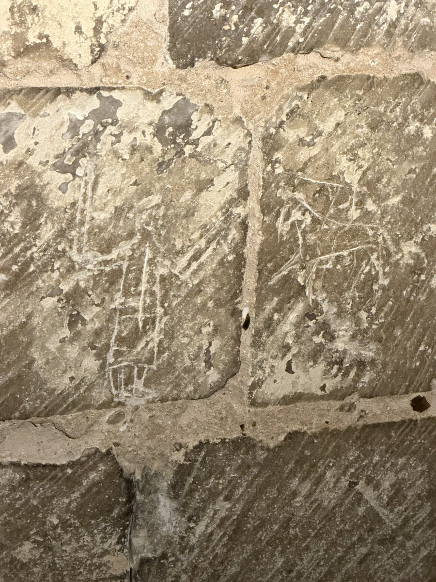 ENortonHistory's tweet image. Graffiti carved into the walls of Colchester Castle, including a man holding a sword, a mounted knight and a circular symbol usually interpreted as a witch mark #colchestercastle #graffiti #colchester #medieval #witchmark