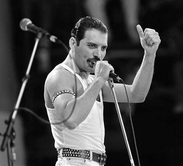 Freddie Mercury at Live Aid at Wembley Stadium in London, 1985. Photo by Neal Preston. The raw energy and power of the performance were so impactful that even Elton John reportedly said: "He went out there and stole the show... the rest of us might as well have gone home".