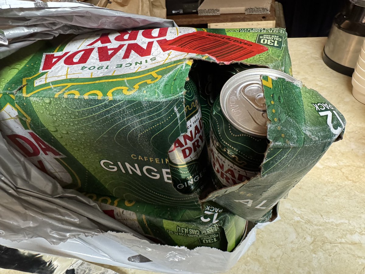 bazuemague's tweet photo. @amazon  99% of the time I sing your praises and love everything you do, but you shipped 2 cases of ginger ale in a plastic envelope and the  cans burst open and soaked the cardboard cases, and then the cases burst open and I’m left with a total mess on my hands. https://t.co/PYv3FVdE5m