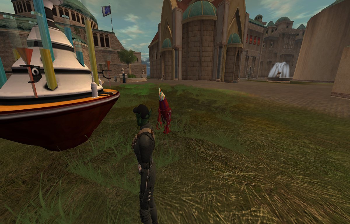 Rojah had already seen the giant floaty cake thing on Tatooine, Mos Eisley.  (Too bad its not edible) But she wanted to see the others so she checked out the one on Naboo and even on Rori (she's too low level to leave town there, though.)  Love the droid's party hats! #SWGLegends