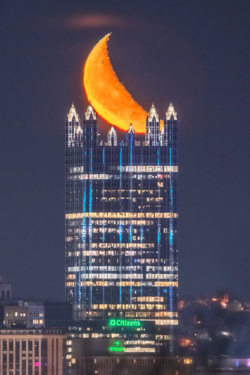 A view from long before that amazing sunrise this morning, of the moon nestled in the spires of PPG Place in #Pittsburgh. I love how you can see the unlit portion of the moon due to the earthshine as well...this is a scene that I'll never tire of capturing.