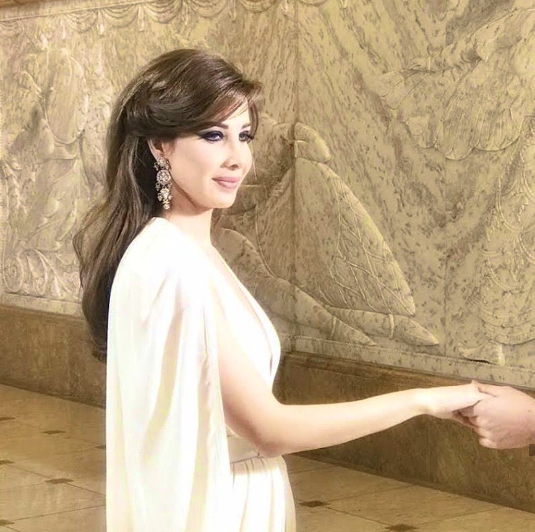 نانسي عجرم تجنن ولكن احس خلفها الكثير من الاسرار الدفينه