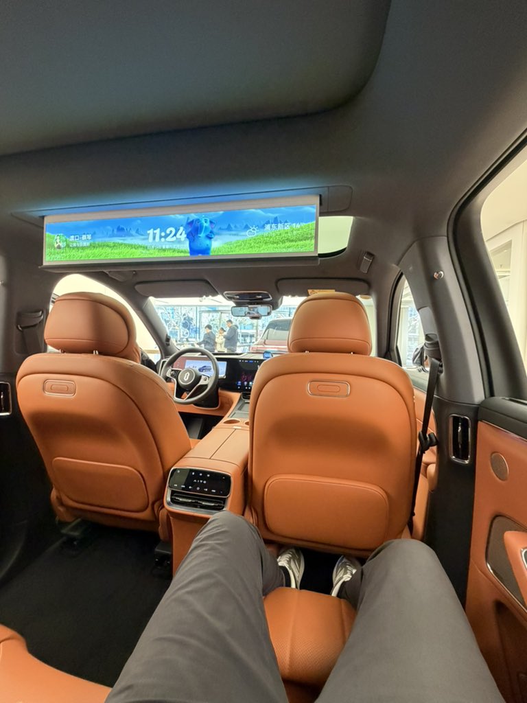 This Chinese suv is 55K usd and has a projector inside lol. Just wild.