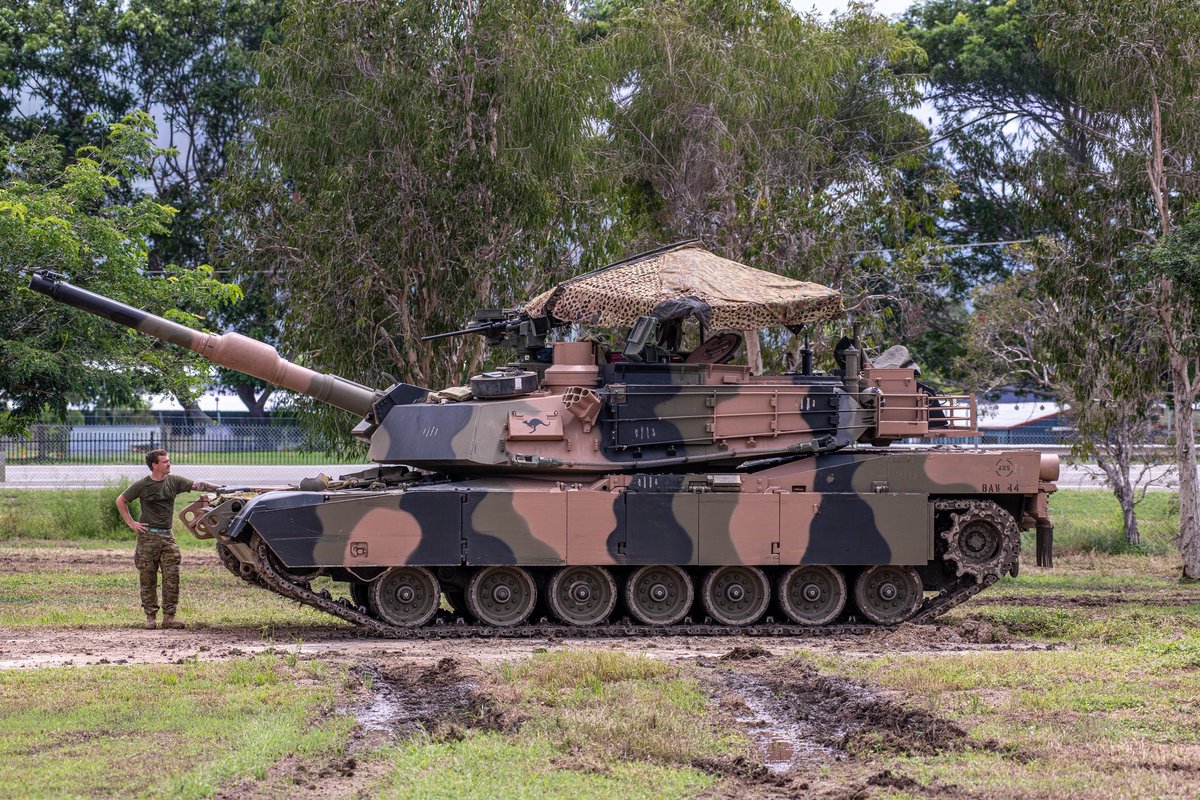 An Australian Army M-1A2 SEPv3 deploys its battle brolly.