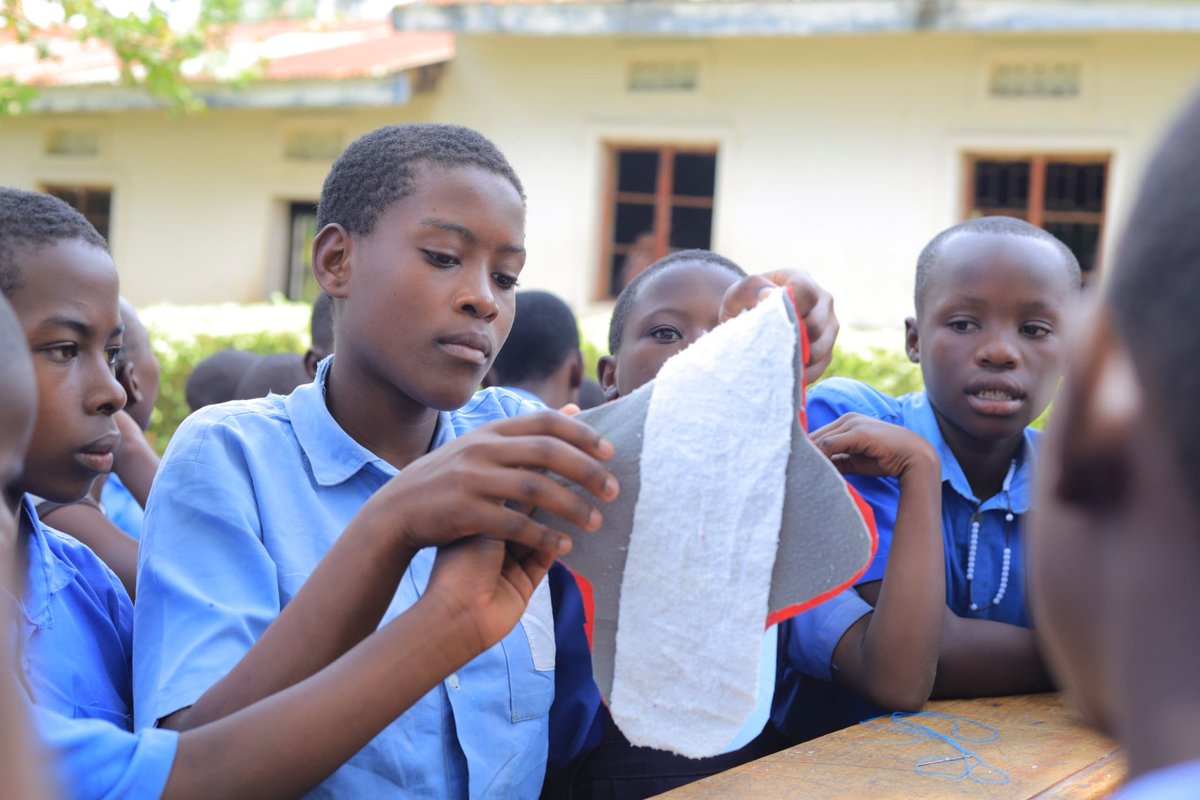 FoundationMug's tweet photo. The Isingiro Pad a Girl outreach was one of its kind, it took place at Kikagati Primary School were over 359 girls attended the session. The team found a very interesting moment with the girls and boys and all of them were skilled in making reusable sanitary pads. https://t.co/88KfAA0fdG