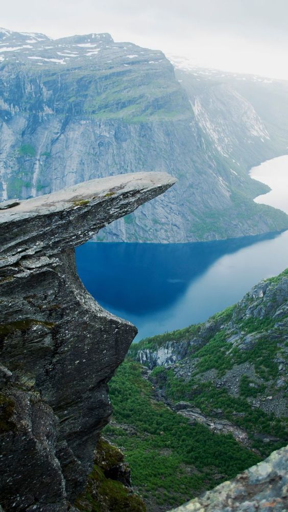 TravelDolce's tweet photo. One of the most dramatic viewpoints in Europe.

#Trolltunga https://t.co/526kiSRog9