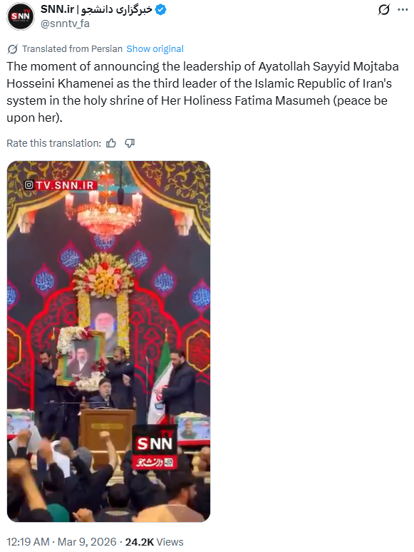 This viral video, which claims to show a cardboard cutout of Iran's new Supreme Leader Mojtaba Khamenei being presented at a rally, is AI-generated.

It's been generated based on a real video pulished by Iranian media of his framed photo being put on a stage at an event.